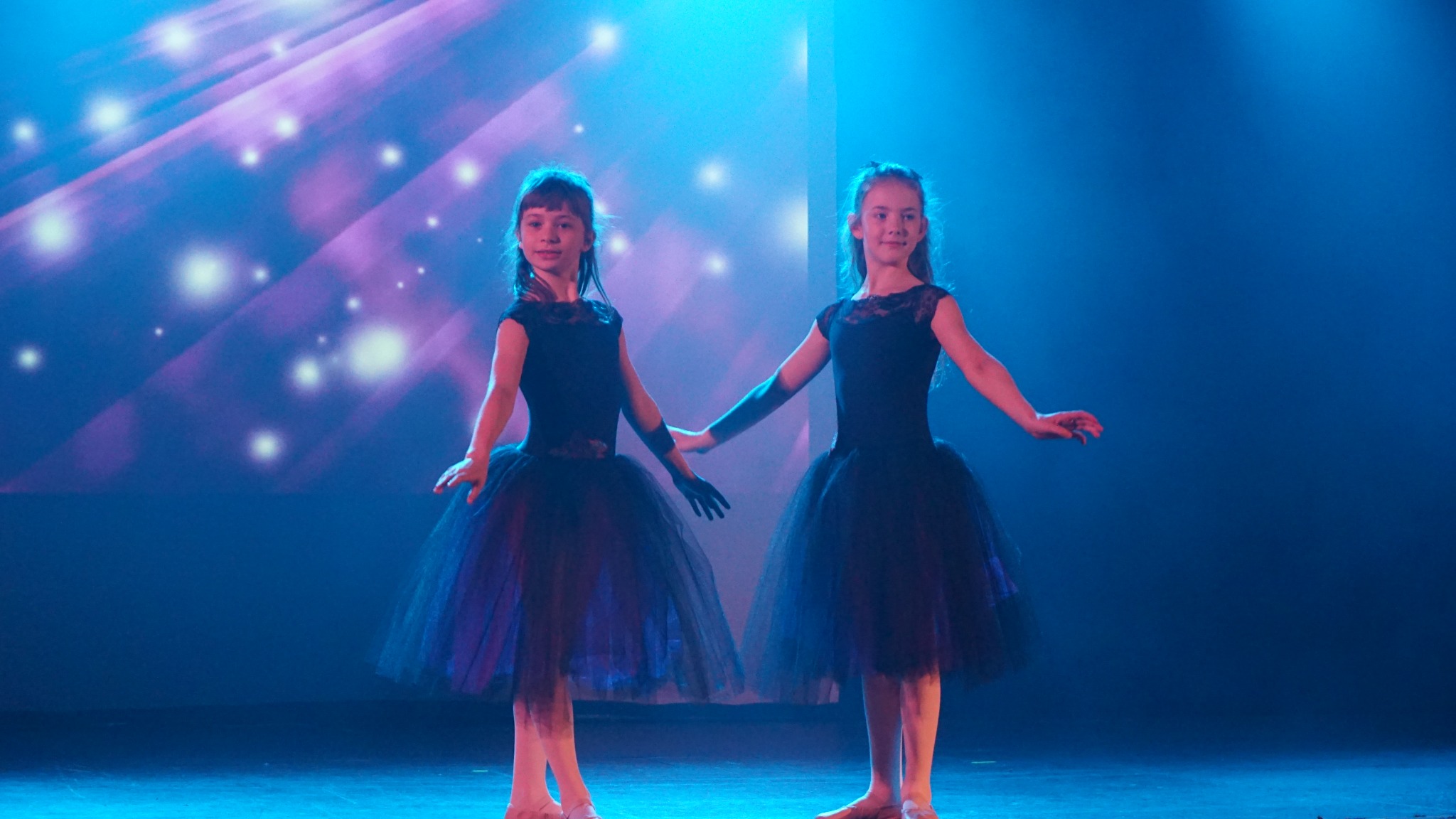 Kay Academy dancers performing together on stage